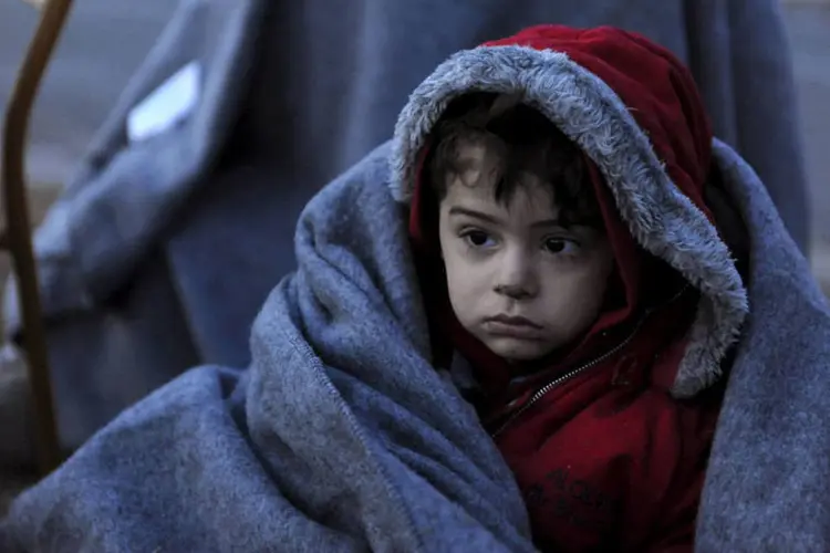 
	Crian&ccedil;a refugiada: a ONG Save the Children lidera uma campanha para que o Reino Unido receba pelo menos 3.000 menores de idade
 (Alexandros Avramidis / Reuters)