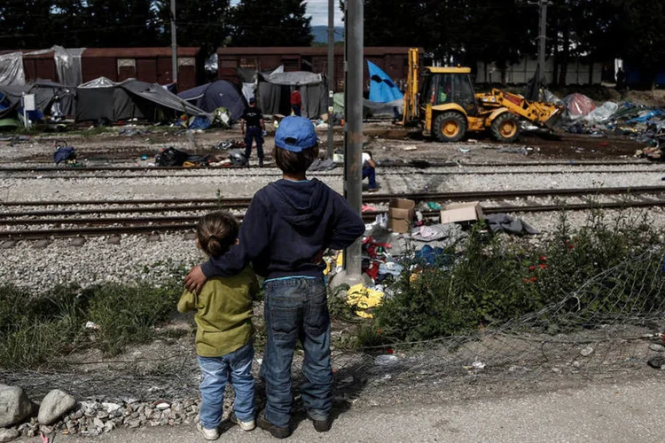 
	Crian&ccedil;as refugiadas: o procedimento de pr&eacute;-registro realizado desde junho atinge 27.592 solicitantes de asilo
 (Yannis Kolesidis / Reuters)