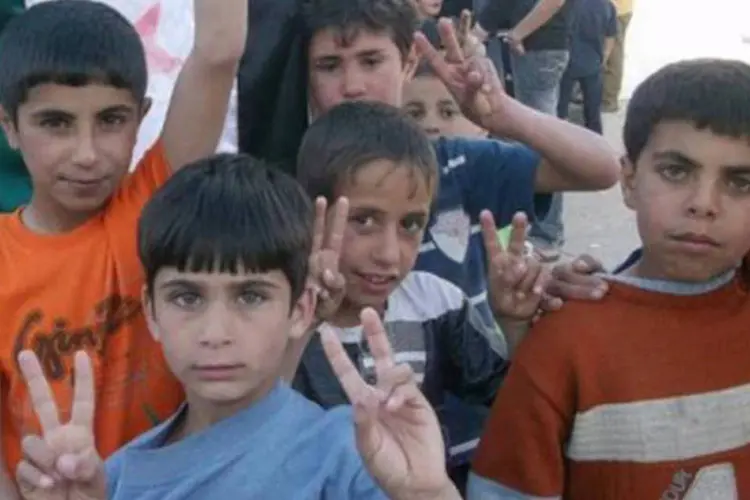 Crianças na Síria: organizações de direitos humanos estimam que cerca de 1.200 crianças morreram nos 15 meses de revolta contra Assad
 (AFP)