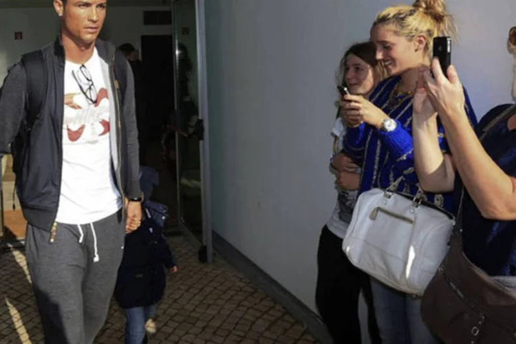 
	Cristiano Ronaldo: o jogador compareceu frente &agrave; m&iacute;dia ap&oacute;s semanas de rumores e informa&ccedil;&otilde;es da imprensa sobre supostas tens&otilde;es no clube
 (Gregorio Cunha/AFP)