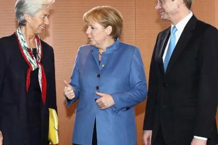 Lagarde e Merkel: 'queremos que a Grécia permaneça na eurozona. No entanto, Atenas deve também cumprir com suas obrigações para com a 'troika' , disse a chanceler alemã (Getty Images)