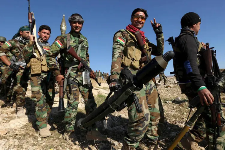 
	Reduto do Estado Isl&acirc;mico: pela manh&atilde;, combatentes Peshmergas entraram na cidade a p&eacute;, a partir do norte
 (Ari Jalal / Reuters)