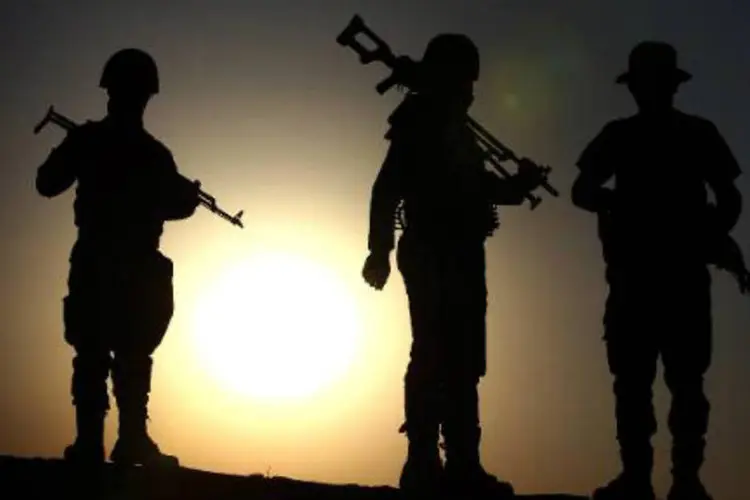 
	Combatentes curdos: fonte acrescentou que h&aacute; coopera&ccedil;&atilde;o com os peshmergas
 (AFP)