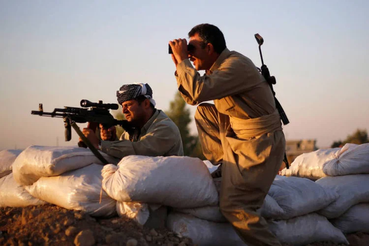 
	Curdos-&aacute;rabes: nas &uacute;ltimas horas, as SDF conquistaram os povoados de Kaber Kibir e Jubb al Kalb, nas imedia&ccedil;&otilde;es de Manbech
 (Ahmed Jadallah / Reuters)