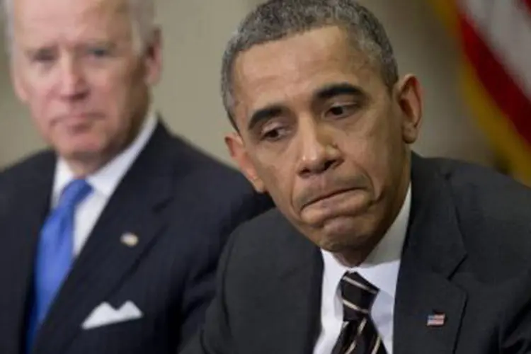
	O presidente Barack Obama e o vice-presidente Joe Biden: Biden reafirmou &quot;o apoio dos Estados Unidos &agrave; luta do governo iraquiano contra os&quot; jihadistas do EI
 (Saul Loeb/AFP)