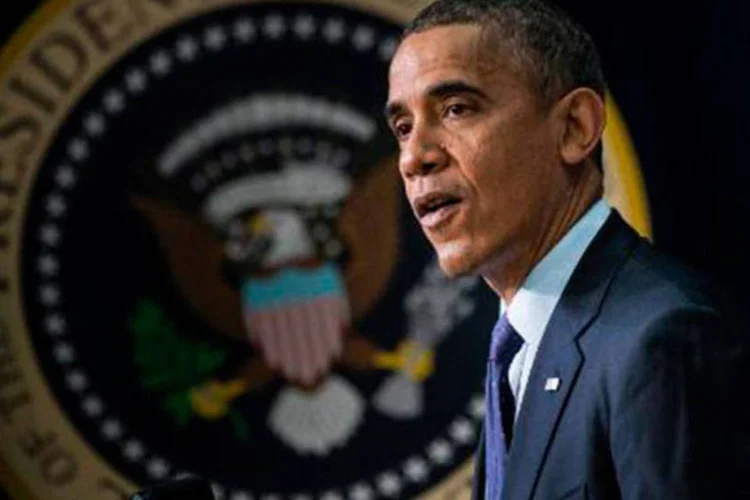 
	Obama: &quot;parte do que estamos tentando fazer no m&ecirc;s que vem... &eacute; uma revis&atilde;o independente... Eu vou propor um comedimento na NSA e iniciar algumas reformas que possam dar &agrave;s pessoas mais confian&ccedil;a&quot;
 (Brendan Smialowski/AFP)