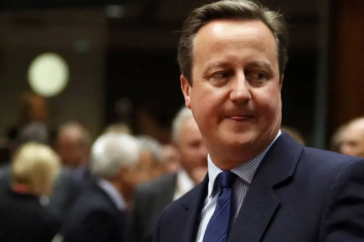 
	David Cameron: &quot;N&atilde;o h&aacute; d&uacute;vida, na minha cabe&ccedil;a, de que esses ser&atilde;o tempos economicamente dif&iacute;ceis&quot;, disse Cameron ao Parlamento
 (Phil Noble / Reuters)