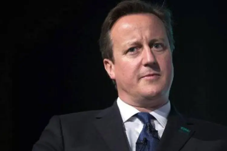 
	David Cameron: Reino Unido prev&ecirc; continuar prestando apoio humanit&aacute;rio &agrave;s milhares de pessoas que fogem do Estado Isl&acirc;mico
 (Oli Scarff/AFP)