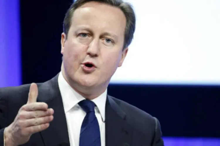 
	Primeiro-ministro do Reino Unido, David Cameron: Cameron voltou a pedir cessar-fogo
 (Jason Alden/Bloomberg)