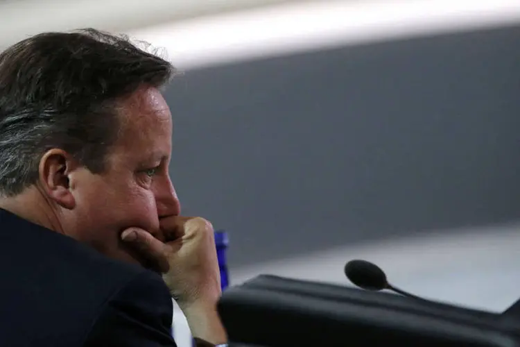 
	David Cameron: ele teve at&eacute; 2010 uma participa&ccedil;&atilde;o em uma empresa offshore de seu pai Ian, j&aacute; falecido, com sede nas Bahamas
 (Jonathan Ernst / Reuters)