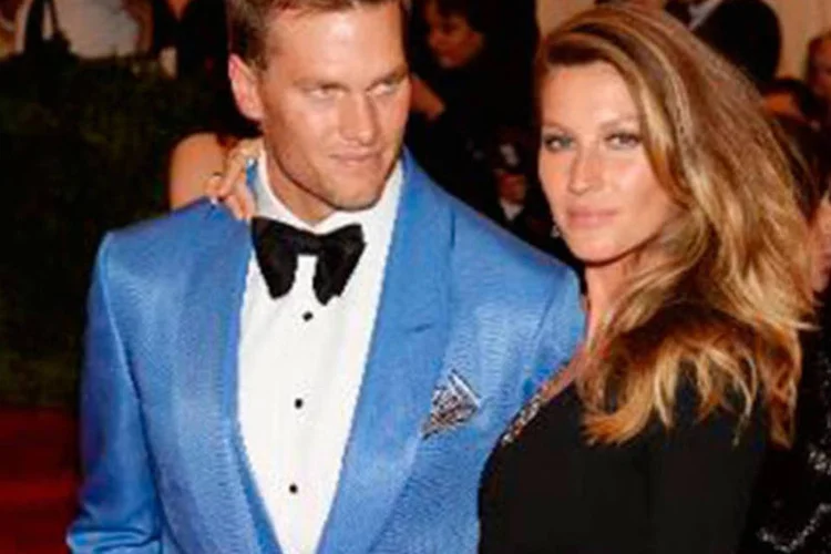 
	Tom Brady e Gisele B&uuml;ndchen: os acusados trabalhavam como seguran&ccedil;as no casamento de Gisele e Brady, em 4 de abril de 2009
 (Dimitrios Kambouris/AFP)