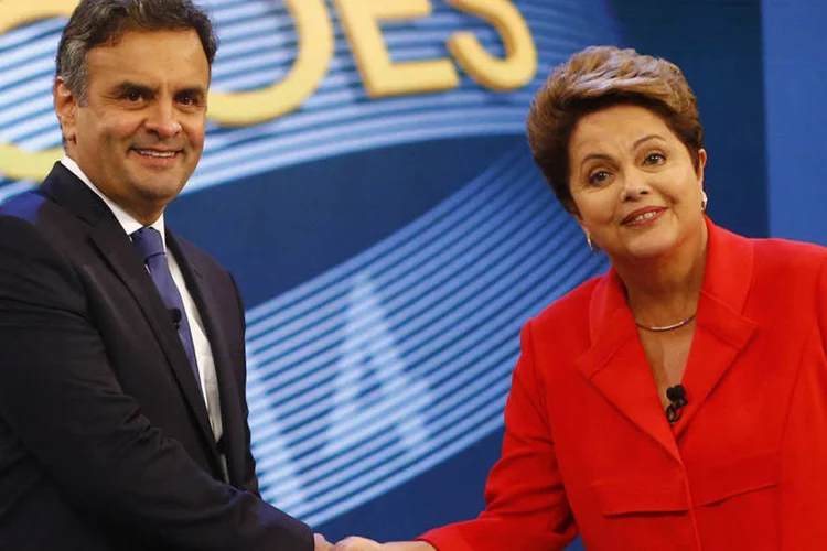 Dilma Rousseff (PT) e Aécio Neves (PSDB) se cumprimentam durante o debate presidencial organizado pela Rede Globo (Ricardo Moraes/Reuters)
