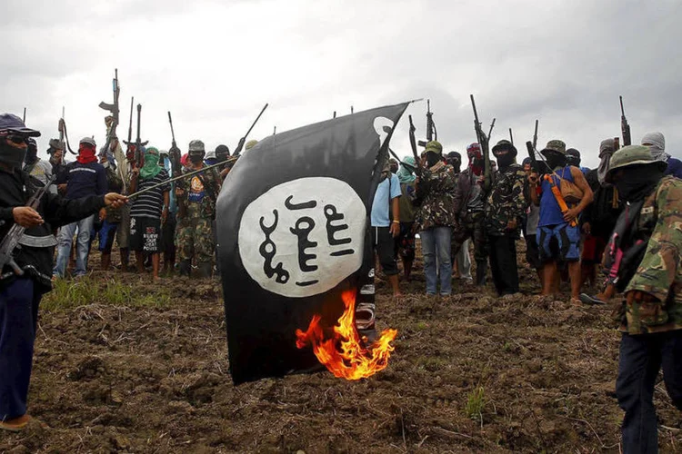 
	Estado Isl&acirc;mico: &quot;Se n&atilde;o podem ir at&eacute; S&iacute;ria, unam-se aos mujahedins das Filipinas&quot;, afirma um dos terroristas
 (Reuters)