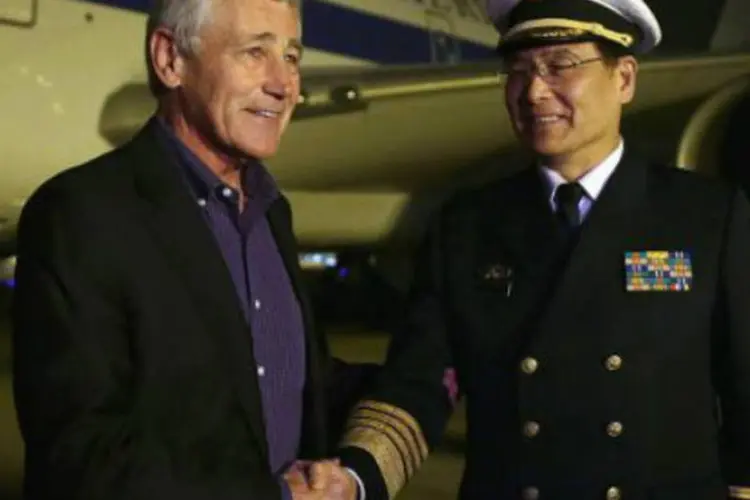 O secretário de Defesa americano, Chuck Hagel, é recebido em Pequim: americano foi o primeiro estrangeiro a subir a bordo do navio (Alex Wong/AFP)