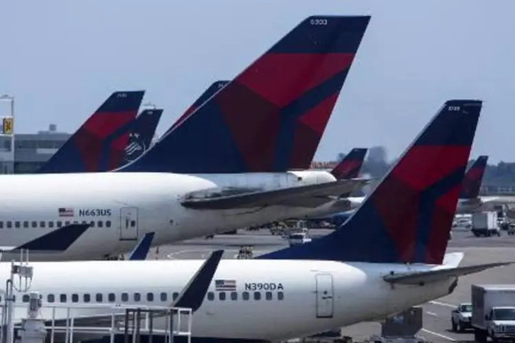 
	Avi&atilde;o da Delta Airlines: empresas possuem acordos de code-share (compartilhamento de voos) para 43 linhas na China e outras 30 nos EUA
 (Eric Thayer/AFP)