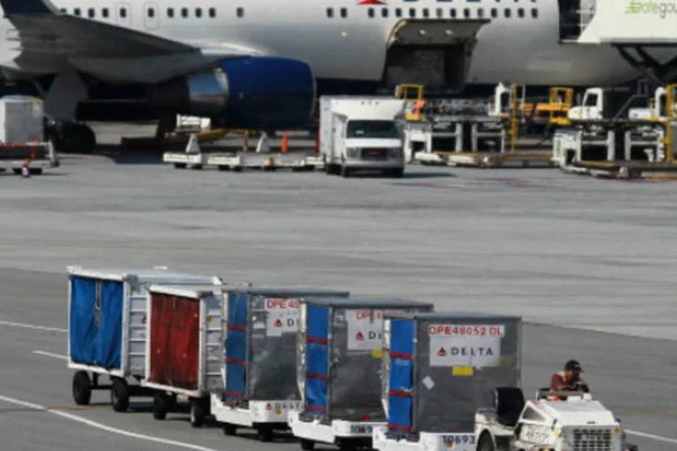 
	Avi&atilde;o da Delta Air Lines: o acordo com a&nbsp;Virgin Atlantic Airways&nbsp;cria uma joint venture que inclui coopera&ccedil;&atilde;o em voos entre Nova York e Londres e benef&iacute;cios rec&iacute;procos para os passageiros
 (Justin Sullivan/Getty Images)