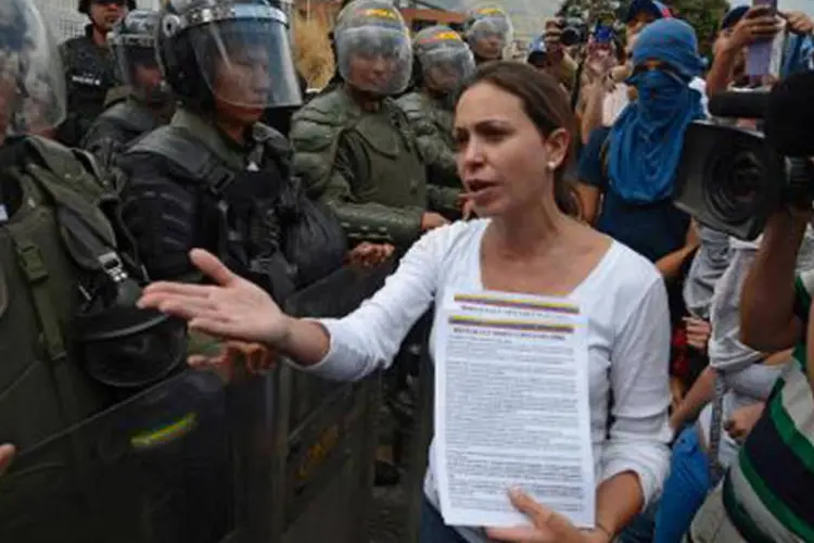 A deputada opositora María Corina Machado: opositora é acusada de promover a violência na onda de protestos que sacode a Venezuela (Juan Barreto/AFP)