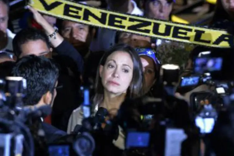 A deputada venezuelana María Corina Machado: deputada foi acusada pelo governo do presidente Nicolás Maduro de promover manifestações violentas (Cris Bouroncle/AFP)