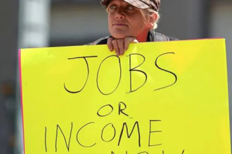 
	Protesto contra o desemprego nos Estados Unidos: pedidos tendem a ser bastante vol&aacute;teis nessa &eacute;poca do ano por conta de feriados e demiss&otilde;es sazonais
 (Justin Sullivan/Getty Images/AFP)