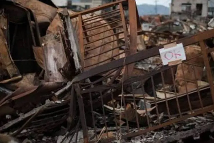 Casas e destroços em Yamada, Japão: o terremoto terá um custo alto para a economia do país (Nicolas Asfouri/AFP)