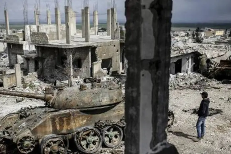 Área destruída na cidade curda de Kobane, na Síria, por confrontos entre o EI e as forças militares (Yasin Akgul/AFP)