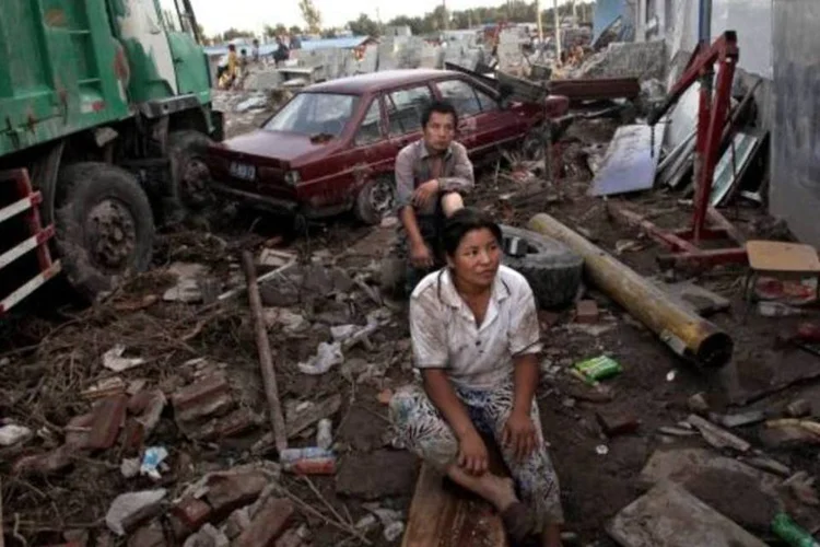 Destruição perto de Pequim, capital da China, após enchentes (Reuters)