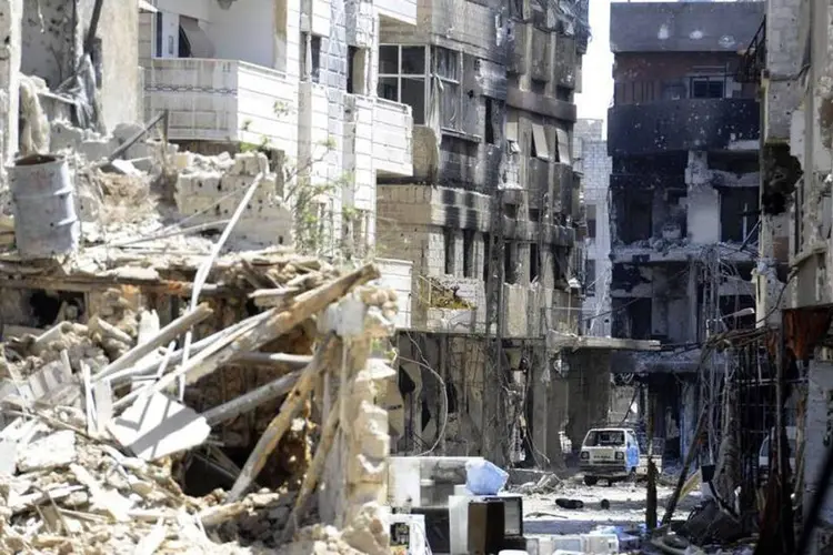 
	Pr&eacute;dios destru&iacute;dos em Mleiha, na regi&atilde;o de Ghouta: cinco desses ataques foram em Duma, outros cinco em Erbin e nove em Harasta
 (Reuters/Omar Sanadiki)
