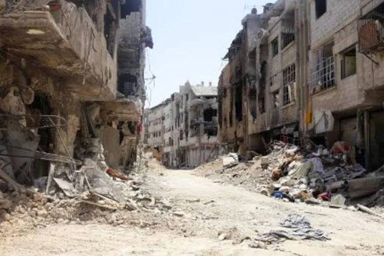 
	Destrui&ccedil;&atilde;o na S&iacute;ria: &quot;Os russos, que investiram tanto em Assad, tentam levar o secret&aacute;rio de Estado americano John Kerry a uma negocia&ccedil;&atilde;o sobre a S&iacute;ria&quot;
 (Louai Beshara/AFP)