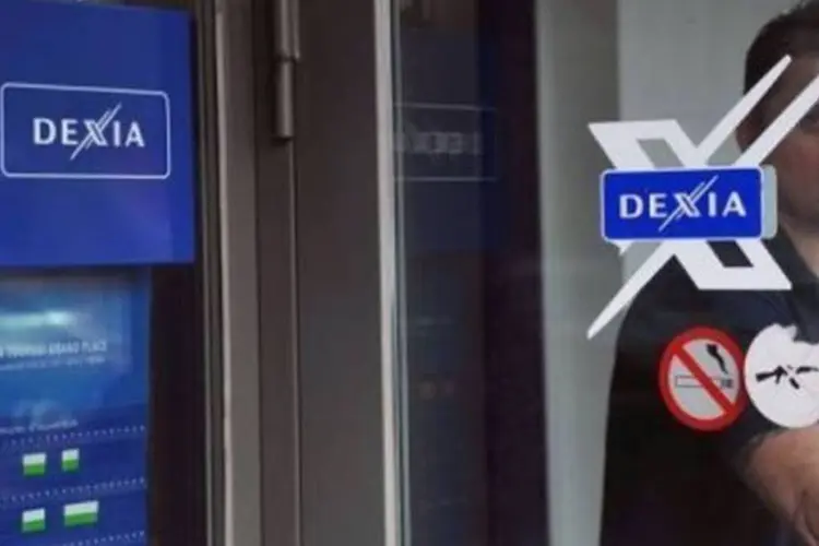 
	Banco Dexia: empresa tem de se desfazer de ativos em decorr&ecirc;ncia da ajuda estatal que recebeu (Philippe Huguen/AFP)