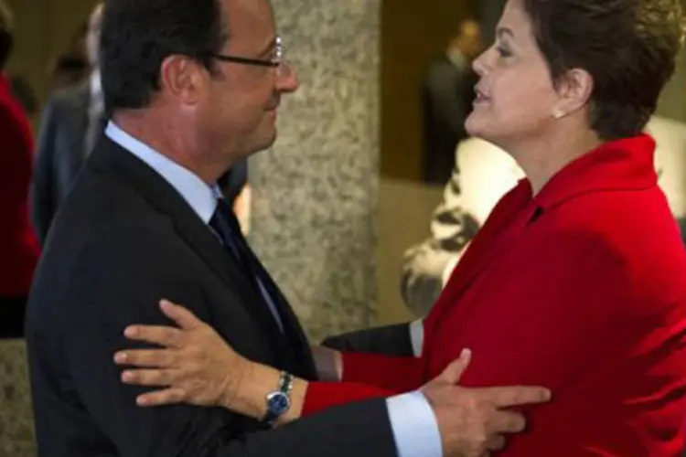 
	Dilma e Hollande durante a Rio+20 realizada em junho de 2012
 (Fred Dufour/AFP)