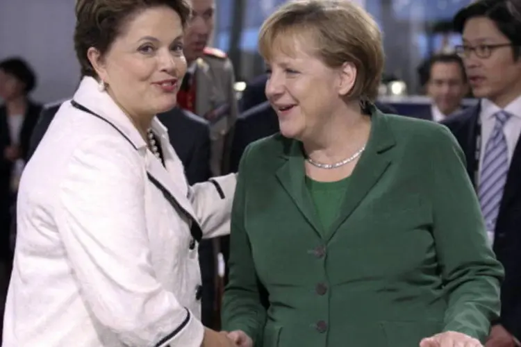 Dilma Rousseff (E) e Angela Merkel, em encontro do G20 (Bloomberg via Getty Images)