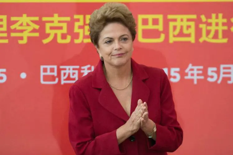 
	A presidente Dilma Rousseff durante cerim&ocirc;nia de assinatura de acordos com a China: o Brasil tamb&eacute;m tem inten&ccedil;&otilde;es de ampliar as rela&ccedil;&otilde;es, comprando mais dos chineses e tamb&eacute;m vendendo mais
 (Marcelo Camargo/Agência Brasil)