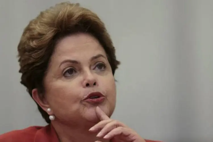 
	Dilma: a ultima previs&atilde;o do governo de fechar o ano com um super&aacute;vit de R$ 10,1 bilh&otilde;es
 (Ueslei Marcelino/Reuters)