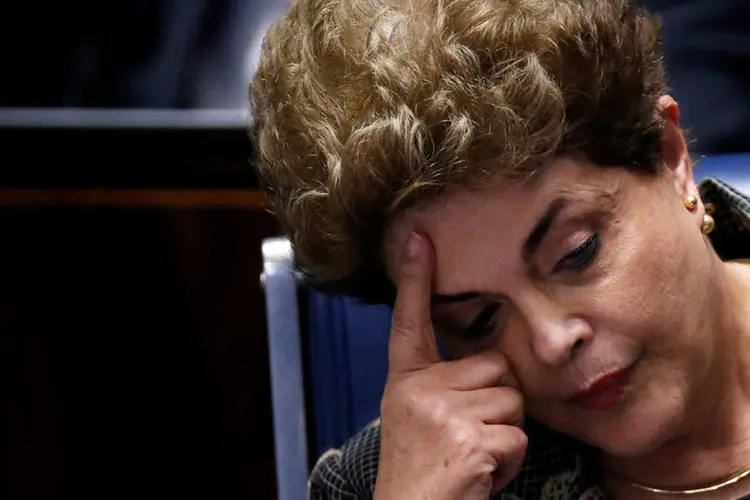 
	Dilma: &quot;Est&aacute; por tr&aacute;s disso uma tentativa de introduzir no espa&ccedil;o pol&iacute;tico a ideia de que, j&aacute; que me absolveram disso, ter&atilde;o de absolver tamb&eacute;m o Cunha&quot;, diz a ex-presidente
 (Ueslei Marcelino / Reuters)