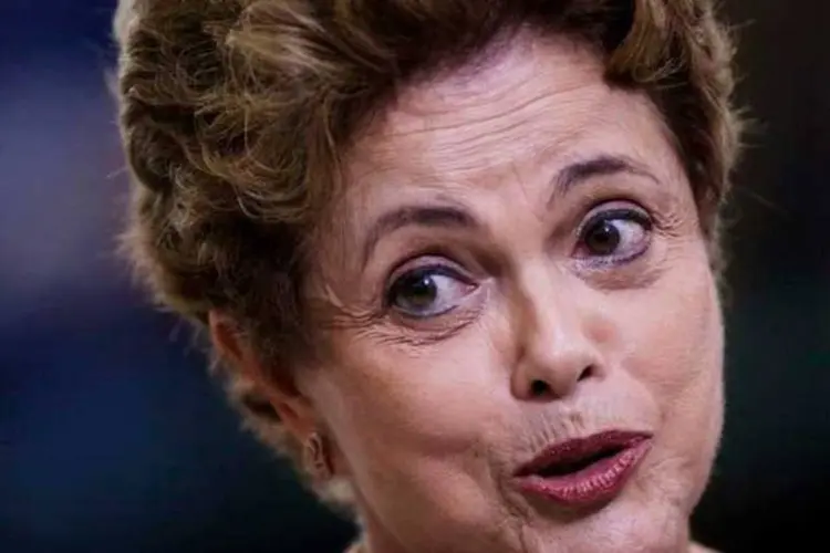 
	Dilma: o governo inicia a semana com desafios como a suspens&atilde;o da posse do ex-presidente Luiz In&aacute;cio Lula da Silva que foi nomeado para o cargo de ministro da Casa Civil
 (REUTERS/Ueslei Marcelino)