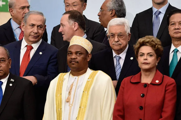 
	L&iacute;deres na COP 21, em Paris: alguma modalidade de acordo hist&oacute;rico parece quase assegurada
 (Pascal Le Segretain/Getty Images)