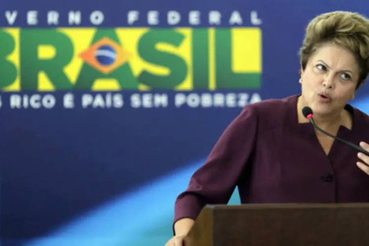 
	Dilma Rousseff: &quot;Quando todo mundo eleva imposto, n&oacute;s reduzimos. N&oacute;s mantivemos a capacidade de buscar um maior equil&iacute;brio entre as vari&aacute;veis macroecon&ocirc;micas&quot;, afirmou
 (REUTERS/Ueslei Marcelino)