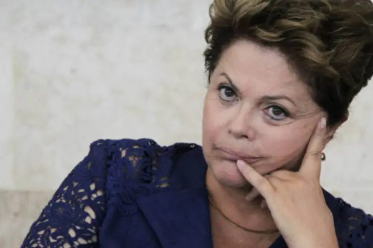 
	A assessoria de Dilma alega que ela foi convidada para a reuni&atilde;o do PT, mas nunca confirmou presen&ccedil;a
 (REUTERS/Ueslei Marcelino)