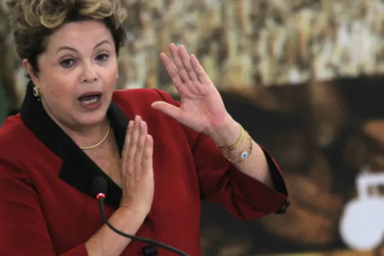 
	A presidente Dilma Rousseff: Dilma, que defendeu uma solu&ccedil;&atilde;o negociada para os conflitos envolvendo a demarca&ccedil;&atilde;o de terras ind&iacute;genas no Pa&iacute;s, ressaltou que o Poder Executivo cumprir&aacute; as decis&otilde;es judiciais e as leis.
 (REUTERS/Ueslei Marcelino)