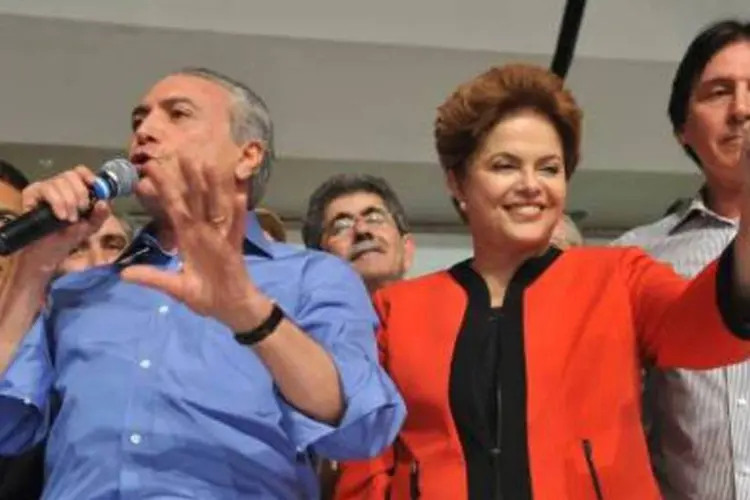 Dilma e Temer: jurisprudência do TSE considera as chapas eleitorais indivisíveis (./Divulgação)