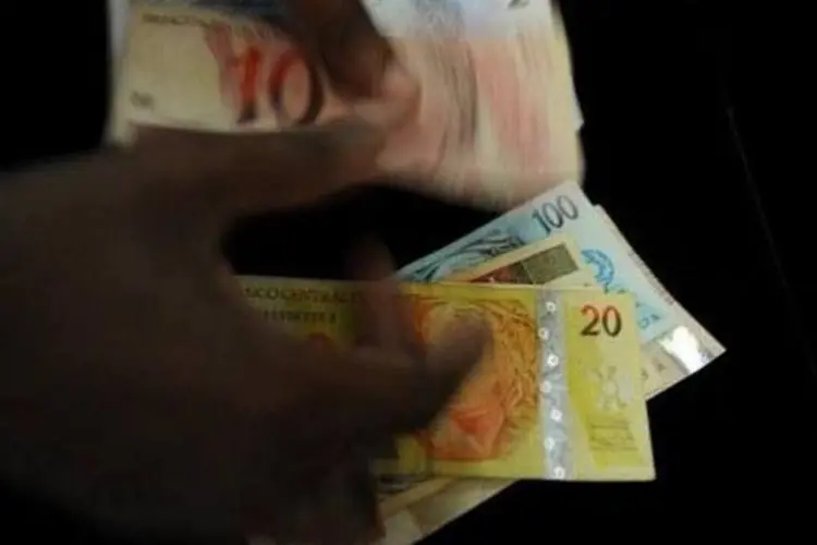 
	Dinheiro: o decreto est&aacute; publicado no Di&aacute;rio Oficial da Uni&atilde;o
 (AFP)