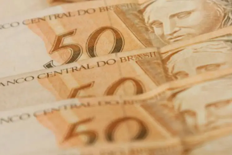 
	Notas de 50 reais: os governos regionais do pa&iacute;s acumulam d&eacute;bitos de US$ 22,6 bilh&otilde;es
 (Marcos Santos/USP Imagens)