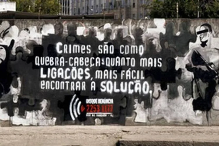Grafite da campanha Disque-Denúncia (Divulgação)