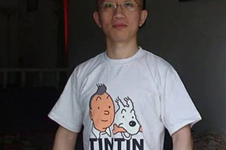 Hu Jia, dissidente de 38 anos, é famoso pela luta a favor dos direitos humanos, vítimas da Aids e do meio ambiente
 (Zeng Jinyan/AFP)
