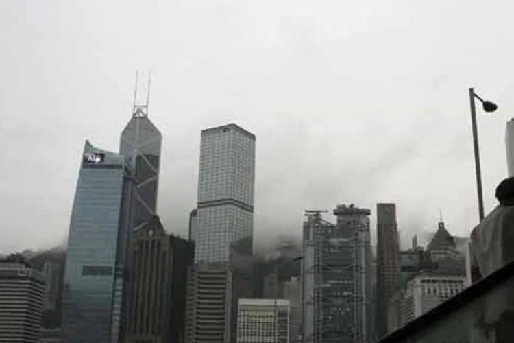 
	Vista do Distrito Central, em Hong Kong:&nbsp;bra&ccedil;o asi&aacute;tico da companhia contrasta com as dificuldades da KKR nos Estados Unidos
 (Andrew Wong/Getty Images)