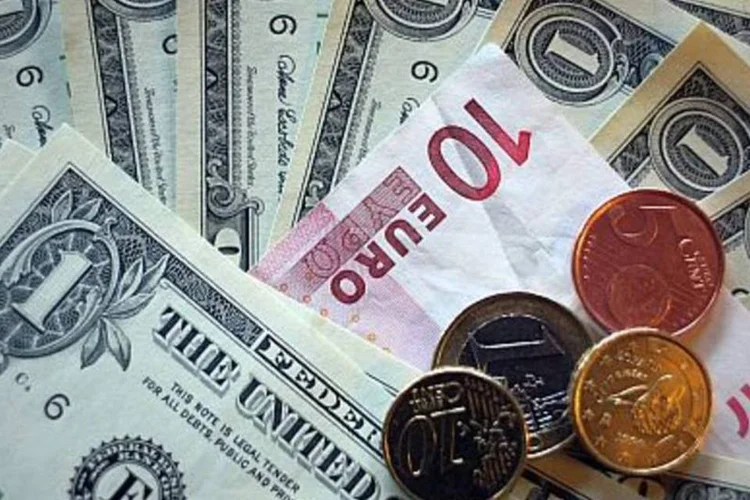 Moedas: os analistas fizeram um ligeiro ajuste para o patamar do dólar no fim do ano (.)
