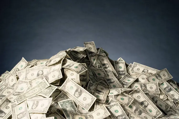 Dólares: Com Lei da Anistia, redução de multas pode gerar economias de milhões de reais (Jupiterimages/Thinkstock)
