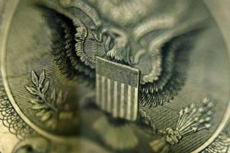 O dólar ante o real descolou-se da queda da moeda norte-americana no exterior no começo da tarde (AFP)