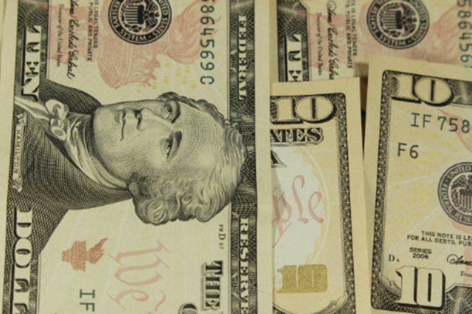 Dólar cai ante real por otimismo com balanços de empresas