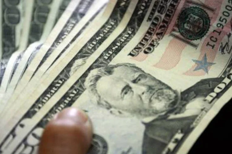
	D&oacute;lares: na semana, o d&oacute;lar acumulou alta de 0,23%
 (Juan Barreto/AFP)